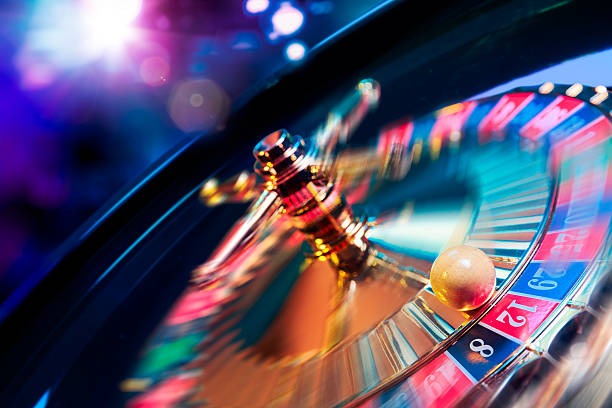 kno89 live-dealer studio with multiple HD cameras, professional lighting, and live dealer at roulette table